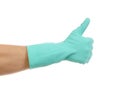 Hand shows thumb up in rubber glove.
