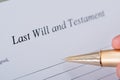 Hand signing last will and testament document Royalty Free Stock Photo