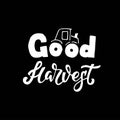 Hand sketched autumn lettering Good Harvest with agricultural machinery