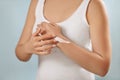 Hand Skin Care. Close Up Of Female Hands Applying Cream, Lotion. Beautiful Woman Hands With  French Manicure Applying Cosmetic Han Royalty Free Stock Photo