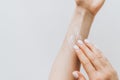 Hand Skin Care. Close Up Of Female Hands Applying Cream, Lotion. Royalty Free Stock Photo