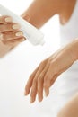 Hand Skin Care. Closeup Of Female Hands Holding Cream Tube