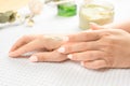 Hand Skin Care. Closeup soft Female Hands With Natural Manicure Nails. Close Up Of Woman`s Hand Touching Her Soft Silky Healthy Royalty Free Stock Photo