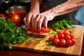 hand slicing fresh tomatoes for bruschetta