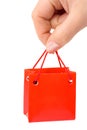 Hand with small bag Royalty Free Stock Photo
