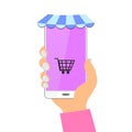 A hand with a smartphon. Online store. Smartphone and shopping cart. Vector