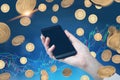 Hand with smartphone, bitcoin rain, graph, blue Royalty Free Stock Photo