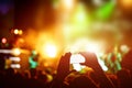 Hand with a smartphone records live music festival, live concert, show on stage Royalty Free Stock Photo