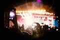 Hand with a smartphone shooting live music festival, concert Royalty Free Stock Photo