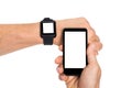 Hand with smartwatch and cellphone Royalty Free Stock Photo