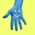 Hand and smiley face in a pop art collage style in neon bold colors. Modern psychedelic creative element with human palm