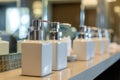 hand soap dispensers on dais, mirror reflection soft