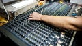 Hand on a sound mixer in a party Royalty Free Stock Photo