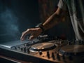 Hands of male dj playing music on modern midi controller turntable digital device for mixing music on events.