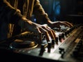 Hands of male dj playing music on modern midi controller turntable digital device for mixing music on events.