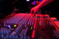 Hand of soundman on the console Royalty Free Stock Photo