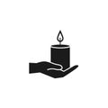 Hand with spa candle silhouette style icon