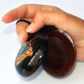 Hand with Spanish castanets