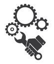 hand with spanner wrench and cogwheel gear machanism icon Royalty Free Stock Photo