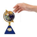 Hand and spinning globe Royalty Free Stock Photo