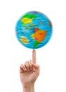 Hand and spinning globe Royalty Free Stock Photo