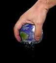 Hand squeeze earth