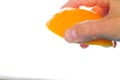 Hand Squeeze Orange Slice Royalty Free Stock Photo