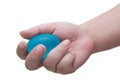 Hand squeezing a blue ball for exercising or relieve stress, isolated on white background Royalty Free Stock Photo