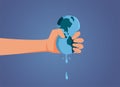 Hand Squeezing the Last Water Drop out of the Earth planet