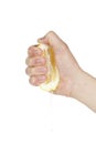 Hand squeezing lemon Royalty Free Stock Photo