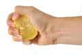 Hand squeezing a lemon Royalty Free Stock Photo