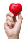 Hand squeezing stress ball in heart shape Royalty Free Stock Photo