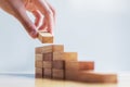 hand stack woods block step on table. business development concept Royalty Free Stock Photo