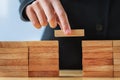 hand stack woods block on table. business development