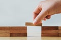 hand stack woods block on table. business development