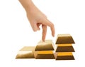 Hand and stairs made of gold bars Royalty Free Stock Photo