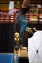 Hand stand Girl on Balance Beam bars Royalty Free Stock Photo