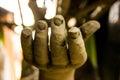 A hand of a statue made of clay under construction asking for help Royalty Free Stock Photo
