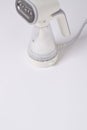 Hand steamer for clothes isolated on a white background Royalty Free Stock Photo