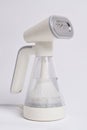 Hand steamer for clothes isolated on a white background Royalty Free Stock Photo