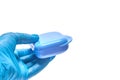 Hand of stomatologist is holding container for custom dental tray Royalty Free Stock Photo