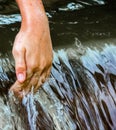 Hand into Stream Royalty Free Stock Photo