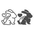 Hand stroking rabbit and heart, animals care line and solid icon, pets care concept, love bunny vector sign on white Royalty Free Stock Photo