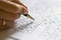 A hand on sudoku grid