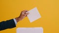 A Hand Casting a Vote.AI generated image Royalty Free Stock Photo