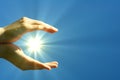 Hand sun and blue sky Royalty Free Stock Photo