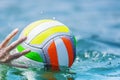 Hand of swimmer water beachball Royalty Free Stock Photo