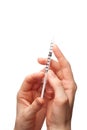 Hand with syringe