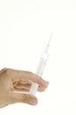 Hand with syringe Royalty Free Stock Photo