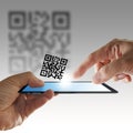 Hand and tablet computer scan Qr code Royalty Free Stock Photo